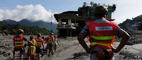 Nepal-China flood rescue on hold as lake breaks banks