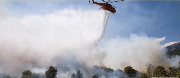 Greece: Fire brigade helicopters collide as wildfires spread